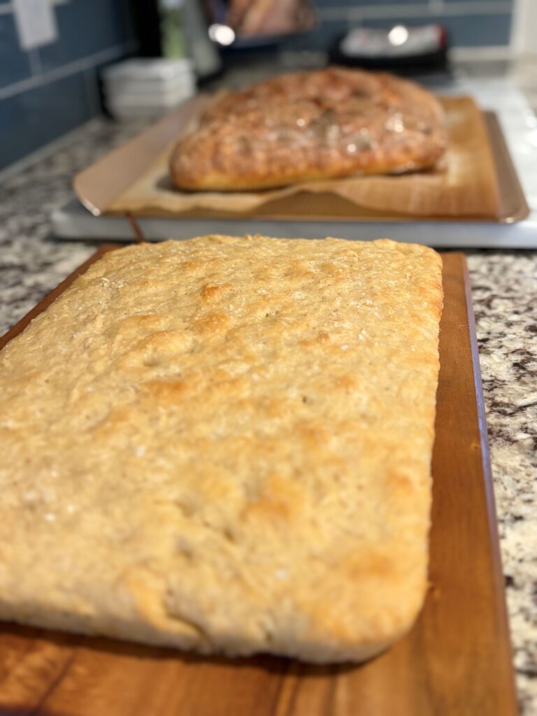 focaccia and artisan bread on counter resized 768x1024